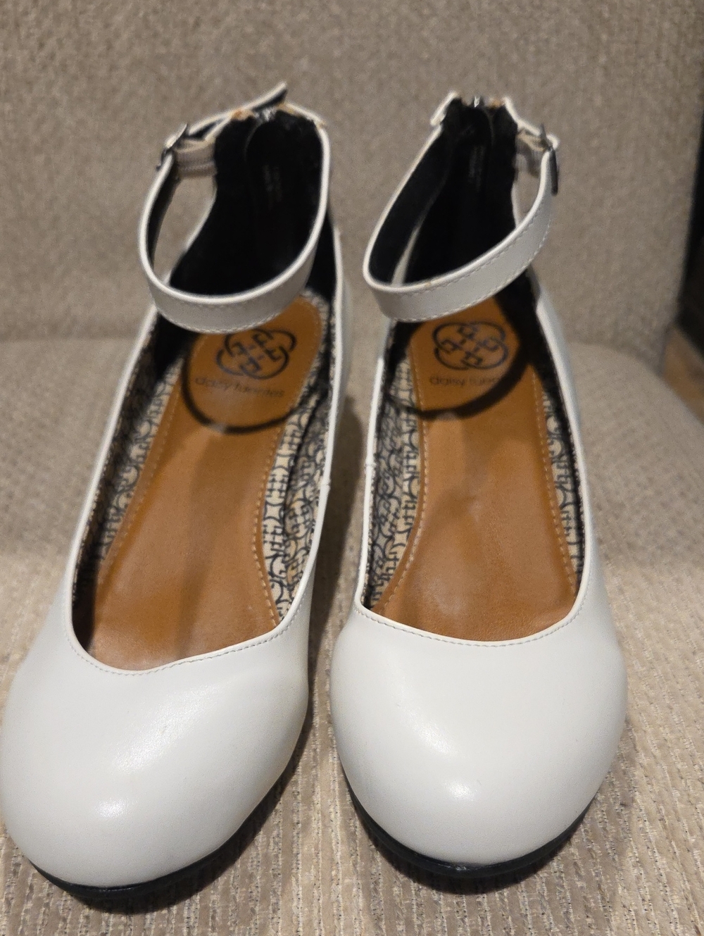 Daisy Fuentes, White Mary Jane-style platform wedges